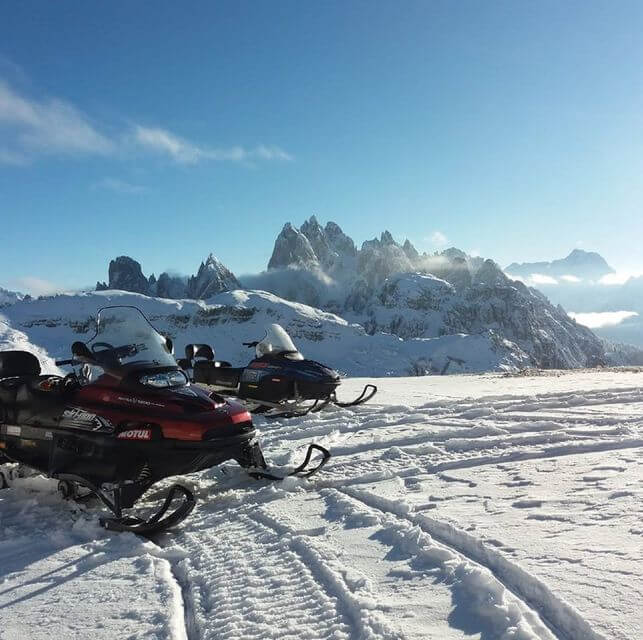 Ontdek de Dolomieten per sneeuwscooter met Get Your Guide