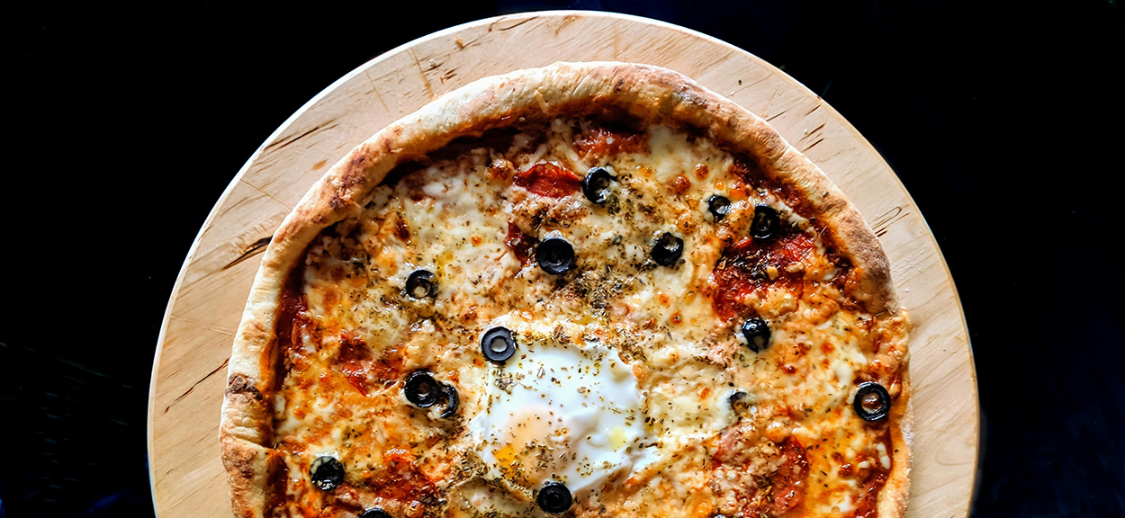 Hoe vind je een echte Italiaanse pizzeria in Amsterdam